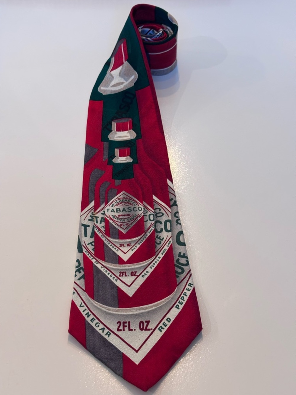 Tabasco Red Tie with Green and White Bottle Motif